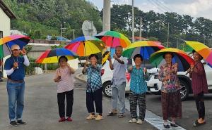 화양사랑후원회, 폭염·폭우 막는 ‘무지개 안심우산’